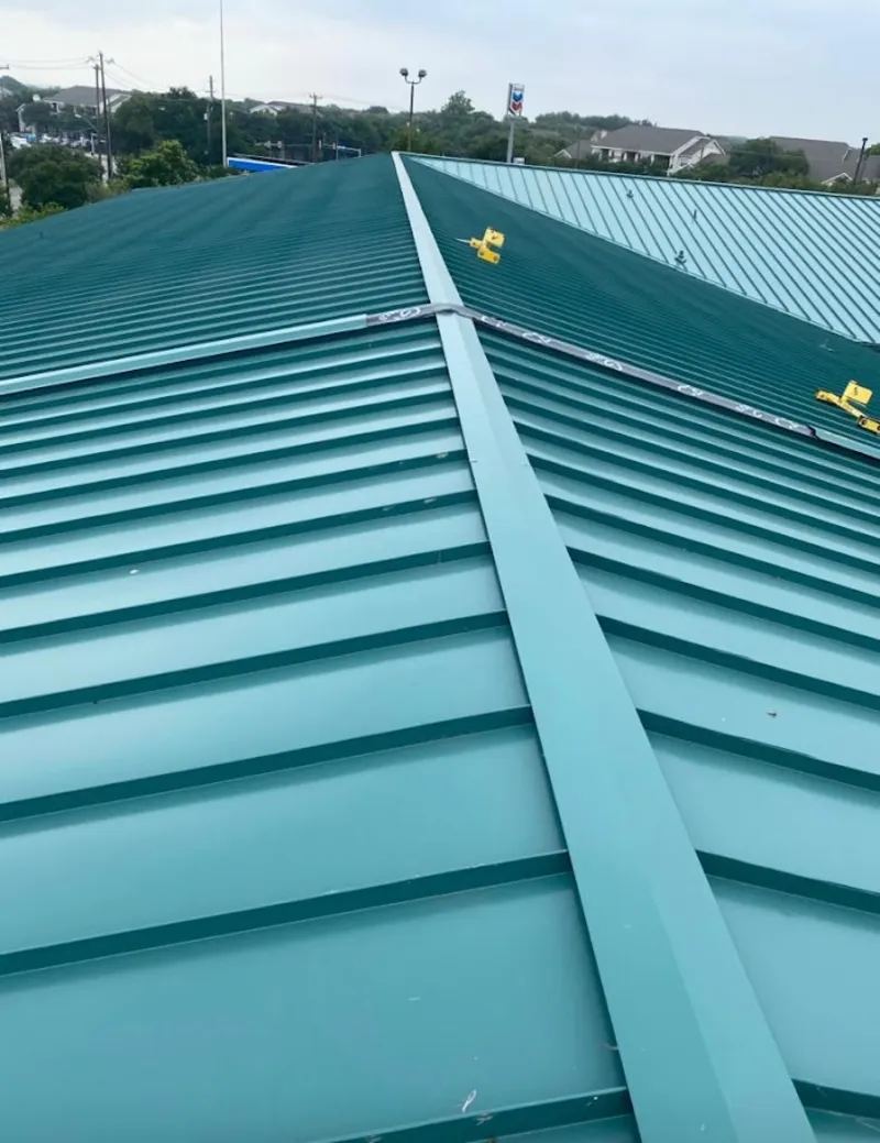 Green commercial metal roof ridge and valley for Metal Roof Repair in Haslet