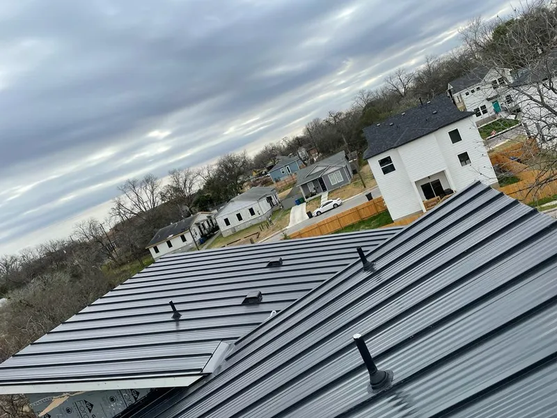 Standing seam metal roof panels with vents for Skylight Repair in Haslet